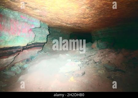 artificial cave under earth journey. wild cave, forgotten passages deep underground Stock Photo