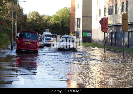 Colchester, UK. 21st Oct 2021. Traffic battles to get through the floodwaters in the Hythe area of Colchester in Essex after heavy overnight rain. Credit: Eastern Views/Alamy Live News Stock Photo