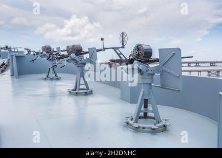 Machine guns on the deck of the USS Alabama museum battleship at the Battleship Memorial Park in Mobile, Alabama Stock Photo