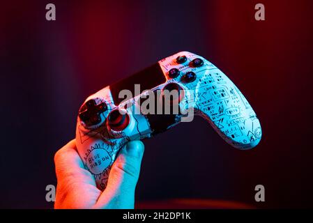 Next Gen game controller on mans hands Stock Photo
