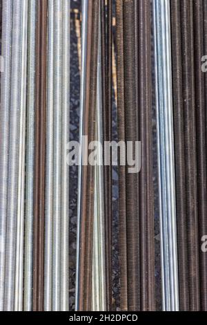 Threaded rods, industrial use Stock Photo - Alamy