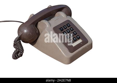 An old and dirty number pad telephone Stock Photo
