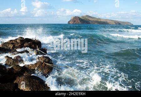 Agia Marina resort, Chania, Crete, Greece Beautiful view of dramatic windswept sea, with view to the nearby Theodori island  Landscape aspect shot Stock Photo