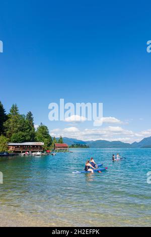 Kochel am See: Walchensee (Lake Walchen), beach, bather, Standup paddleboarding (SUP) in Oberbayern, Upper Bavaria, Bayern, Bavaria, Germany Stock Photo