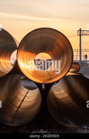 hollow large iron sewer pipes Stock Photo