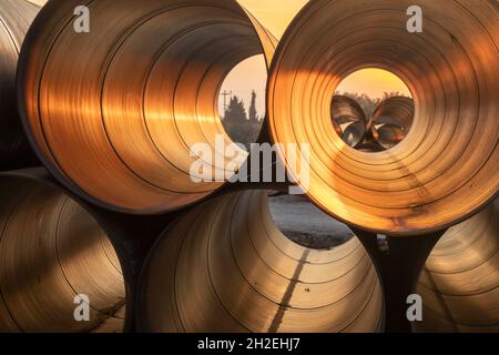 hollow large iron sewer pipes Stock Photo