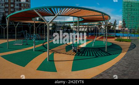 Exercise equipment for physical therapy on the site in front of the hospital. Physical activities for disabled people Stock Photo