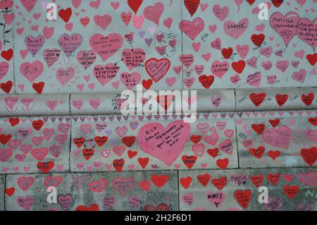 London, UK. October 14, 2021. The National COVID Memorial Wall , covered in tributes in memory of all the lives lost to COVID-19.