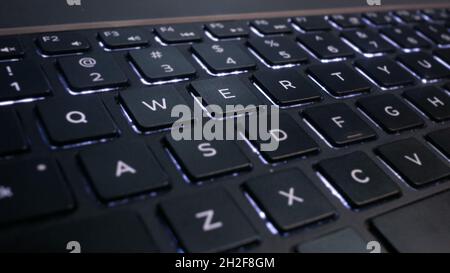 Lit up QWERTY keyboard Stock Photo