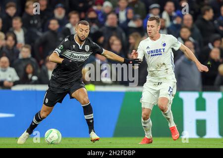 Copenhagen, Denmark. 21st Oct, 2021. Lukas Lerager (12) of FC Copenhagen and Omar El Kaddouri (7) of PAOK FC seen during the UEFA Europa Conference League match between FC Copenhagen and PAOK FC at Parken in Copenhagen. (Photo Credit: Gonzales Photo/Alamy Live News Stock Photo