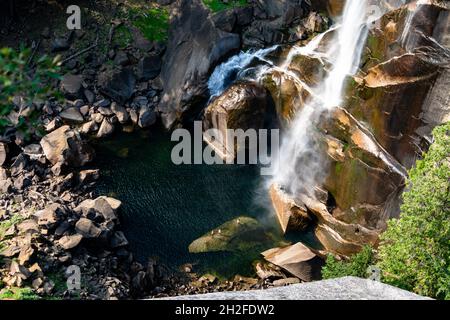 Vernal Falls With Long Exposure Surrounded By Greenery In Yosemite 