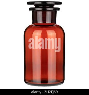 Closed clasisc medical bottle of amber color glass. Glass jars with chemicals. Closed amber bottle Stock Photo