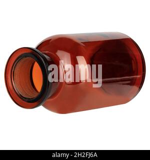 Closed medical bottle of brown color glass. Glass jars with chemicals. lying open bottle Stock Photo