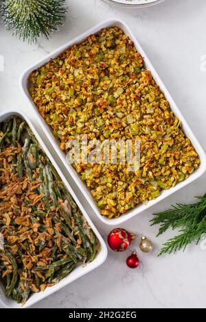 Christmas dinner side dishes including greean beans casserole and stuffing Stock Photo