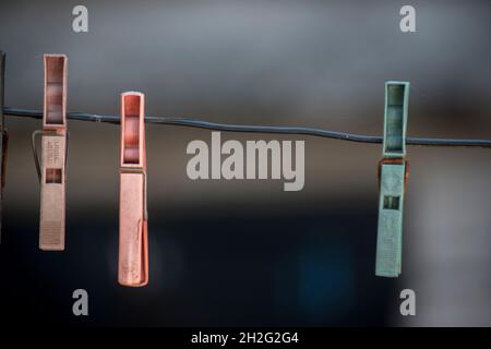 plastic clips to hang freshly washed clothes Stock Photo