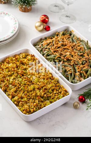 Christmas dinner side dishes including greean beans casserole and stuffing Stock Photo
