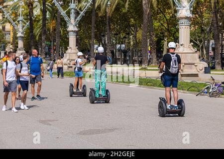 Barcelona, Spain - 23.September 2021: Tourist on Segway vehicles exploring the city. Ninebot and scooter are a popular form of transport for exploring Stock Photo