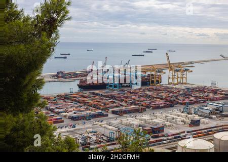 Barcelona, Spain -September 21, 2021: Container port of Barcelona. Container ships on the pier. cargo ships are unloaded at the quay. Logistics and tr Stock Photo