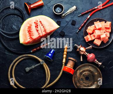 Aromatic smoking hookah with watermelon flavored tobacco Stock Photo