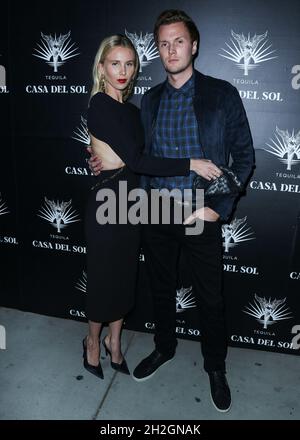 Los Angeles, United States. 21st Oct, 2021. LOS ANGELES, CALIFORNIA, USA - OCTOBER 21: Socialite Tessa June Grafin von Walderdorff Hilton and husband Barron Hilton II arrive at Brian Bowen Smith's Drivebys Book Launch And Gallery Viewing Presented By Casa Del Sol Tequila held at 8175 Melrose Ave on October 21, 2021 in Los Angeles, California, United States. (Photo by Xavier Collin/Image Press Agency) Credit: Image Press Agency/Alamy Live News Stock Photo
