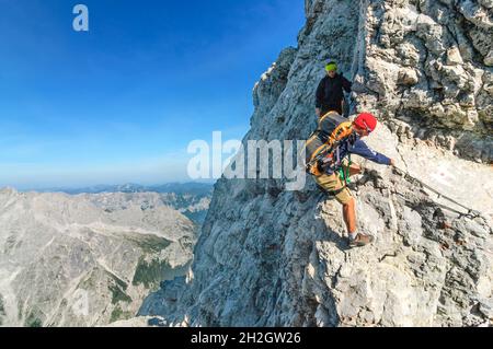 Alpinists doing high alpine tour at the Watzmann mountain in bavaria Stock Photo