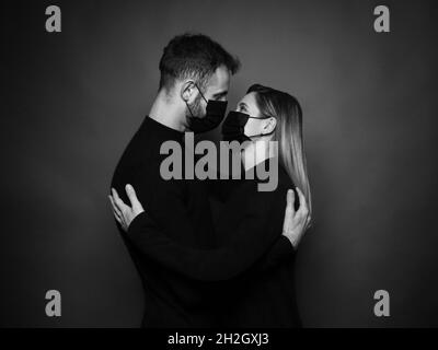 couple with antivirus mask Stock Photo
