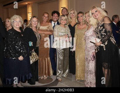 Milan, Italy. 22nd Oct, 2021. Milan, Italy Daniela Javarone with her husband Mario Girardi celebrate their golden wedding anniversary at the Principe di Savoia hotel with relatives and historical friends In the picture: Daniela Javarone with friends Credit: Independent Photo Agency/Alamy Live News Stock Photo