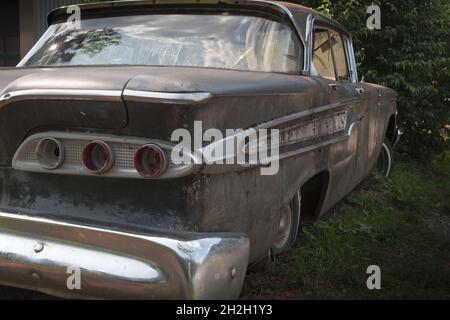 Rear partial view of the rear window of a vintage convertible from the ...