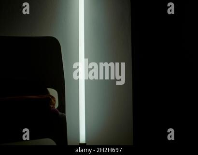 Futuristic light Led Light In Modern Apartment Laying on Floor. Copy Space Stock Photo