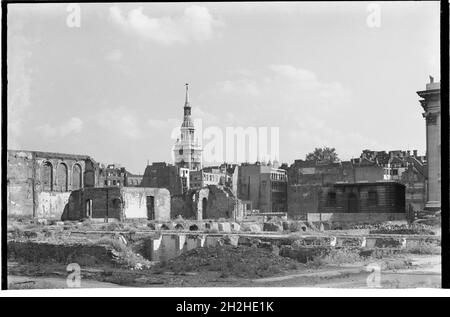 St Mary-le-Bow Church, Cheapside, City and County of the City of London, Greater London Authority, 1941 - 1945. A view looking south-east across a bomb damaged landscape towards St Mary-le-Bow Church, with a corner of Goldsmiths Hall just visible on the right. St Mary-le-Bow was rebuilt by Christopher Wren after the Great Fire of London in 1666. During the Second World War it was almost destroyed by bombing on 10th May 1941 with incendiary bombs causing a fire which sent the bells in its tower crashing down to the ground. The tower was left standing and restoration of the church began in 1956.