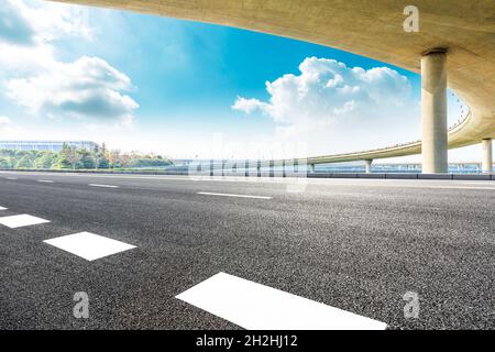 Asphalt road and viaduct with blue sky in shanghai. Stock Photo