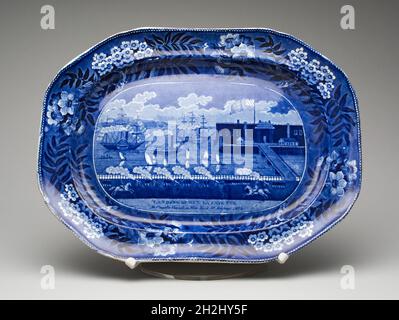 Platter, 1824/36. Decorated with scene of steamships and cannon fire: 'Landing of Gen. La Fayette At Castle Garden, New York, 16 August 1824'. Made in Stoke-on-Trent, Staffordshire, England, for the American market. Stock Photo