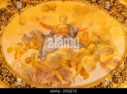 ROME, ITALY - SEPTEMBER 1, 2021: The ceiling baroque fresco of Assumptin the church Chiesa di Santa Maria in Campitelli. Stock Photo