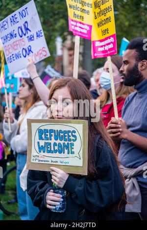 Woman with Refugees Welcome placard, a 4th generation Jewish refugee, Refugee rally against the new Nationality and Borders Bill, Parliament Square, London, UK, 20/10/2021 Stock Photo