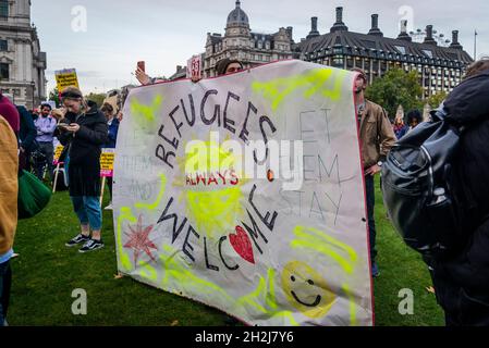 Refugees always welcome banner, Refugee rally against the new Nationality and Borders Bill, Parliament Square, London, UK, 20/10/2021 Stock Photo