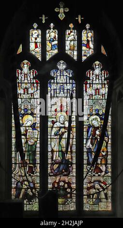 A stained glass window by Herbert Bryans depicting the Blessed Virgin, St anna and St Elizabeth, St Peter's Church, Dunchurch, Warwickshire Stock Photo