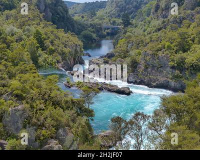 The Huka Falls are a set of waterfalls on the Waikato River that drains Lake Taupo in New Zealand. Stock Photo