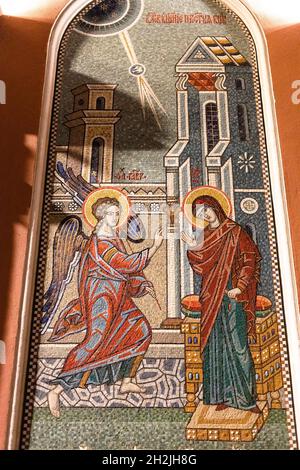 Moscow, Russia - August 31, 2021: outdoors mosaic Archangel Gabriel blesses of the Virgin Mary on wall of Church of the Holy Great Martyr George the V Stock Photo