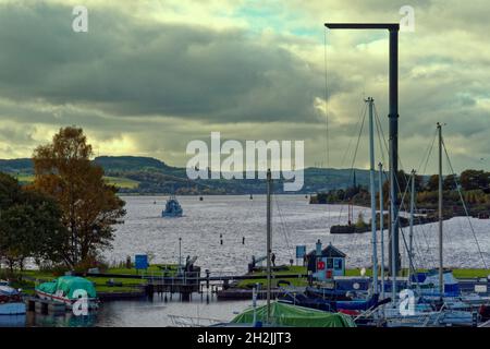 Bowling, Glasgow, Scotland, UK 22nd October, 2021.UK  Weather: Sunny new bowling high line in Bowling like the famous one in new york is mirrored on the old railway bridge near Glasgow A gunboat patrols the clyde for cop 26.   Credit: Gerard Ferry/Alamy Live News Stock Photo