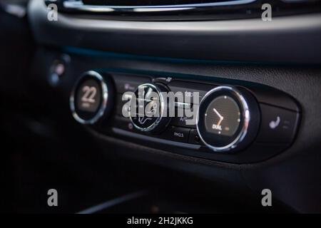 multimedia control console and climate in a modern premium car. close-up, selective focus, no people Stock Photo