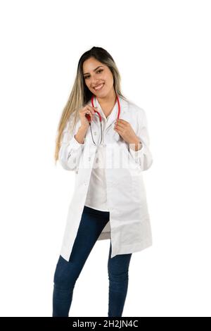 Young Latina doctor with a big smile standing with holding the stethoscope in white background. Concept of professional woman, health personnel. Ameri Stock Photo