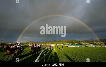A rainbow appears over the course during The Andy Stewart Memorial Amateur JockeysÕ Handicap Chase at Cheltenham racecourse. Picture date: Friday October 22, 2021. Stock Photo