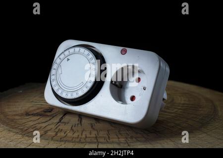 electrical control plug on wooden table Stock Photo