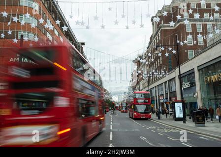 London, UK.  22 October 2021.  Christmas decorations are suspended overhead ahead of the Oxford Street Christmas Lights switch on in the next few weeks.  Retailers are hoping that shoppers will be back in large numbers and not be deterred by possible shortages of product and inflationary pressures.  Credit: Stephen Chung / Ģ����ý Live News Stock Photo
