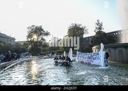 Milan, Italy. 22nd Oct, 2021. Milan, Italy - 22 October 2021: Fridays For Future climate activists wearing masks depicting world leaders, stage a flash mob in front of the Sforza Castle in preparation of the G20 Credit: Piero Cruciatti/Alamy Live News Stock Photo