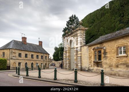 Bathurst Estate entrance and tall yew tree hedge at Park Street, Cirencester, Gloucestershire, England Stock Photo