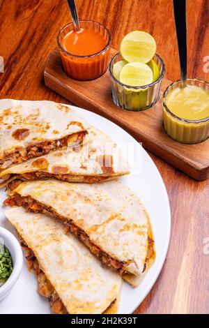 Shepherd's meat tacos with corn tortillas. Gringa with cheese Stock Photo