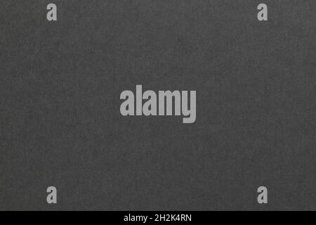 Abstract dark gray grunge paper texture background, Black cardboard surface from a paper box for packing. Stock Photo