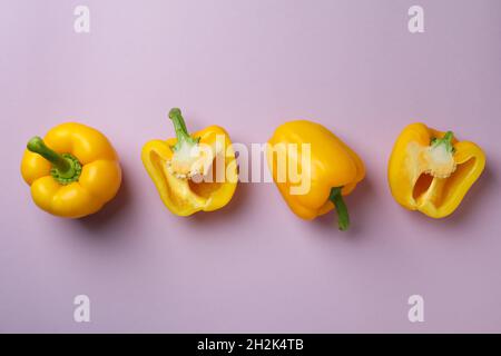 Flat lay composition with bell pepper on purple background Stock Photo