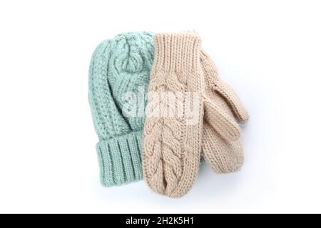 Knitted hat and mittens isolated on white background. Stock Photo